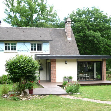 Imbrication d'espaces de vie en extension d'une maison