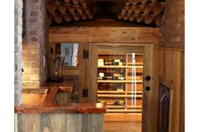 Inspiration for a rustic wine cellar remodel in Denver