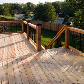 Smith - Cedar deck in Kansas City with stamped concrete patio.