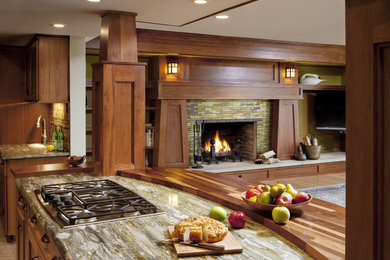 Inspiration for a large craftsman open concept light wood floor and brown floor family room remodel in Milwaukee with beige walls, a standard fireplace and a tile fireplace