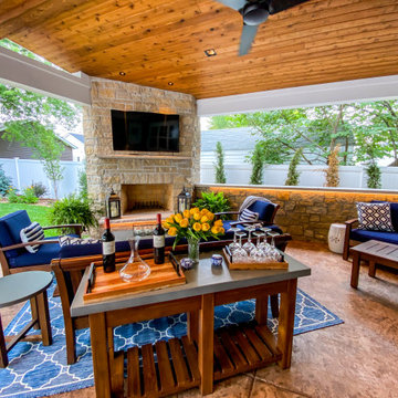 Covered Patio with a Fireplace Feature