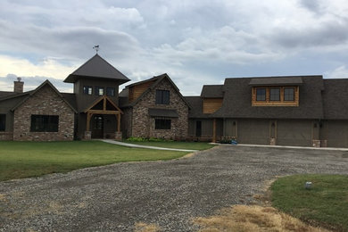Large cottage two-story brick exterior home photo in Oklahoma City