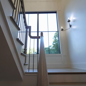 Project #93 | Captivating Staircase with Light Wood and Black Spindles
