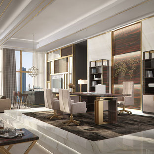 Inspiration for an expansive modern study in London with marble flooring and a freestanding desk.