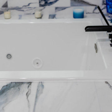 Bathroom remodeling in Columbia, MD with double vanity & marble bathtub