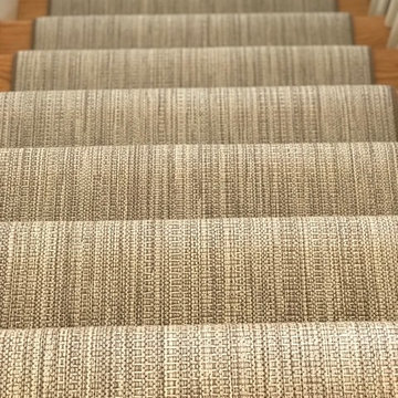 Textured Stair Runner Against Floral Wallpaper