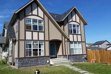 Inspiration for a craftsman exterior home remodel in Calgary