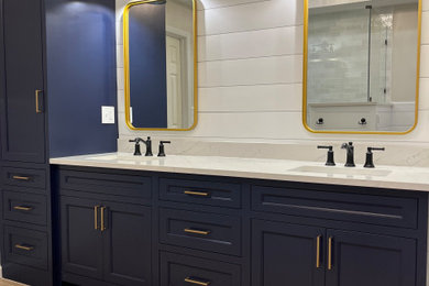 Inspiration for a mid-sized contemporary master white tile and ceramic tile porcelain tile, beige floor, double-sink, vaulted ceiling and shiplap wall bathroom remodel in Kansas City with shaker cabinets, blue cabinets, a two-piece toilet, white walls, an undermount sink, quartz countertops, a hinged shower door, white countertops, a niche and a built-in vanity