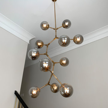 New Home in Bettendorf Quad Cities with Modern Lighting and Custom Cabinetry