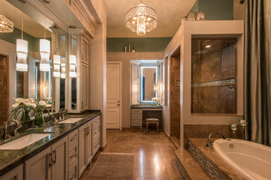 Inspiration for a mid-sized modern master travertine floor bathroom remodel in Phoenix with furniture-like cabinets, gray cabinets, an undermount sink and granite countertops
