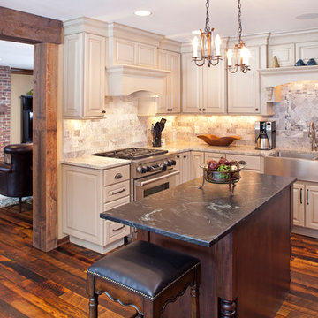 Antique Skip Oak Flooring in a Traditional Kitchen and Living Room