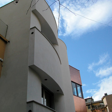 Riqualificazione di edificio bifamiliare