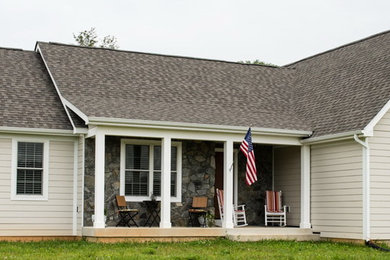 Small traditional beige one-story concrete fiberboard gable roof idea in DC Metro