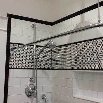 Takoma DC traditional back and white bathroom with penny tile