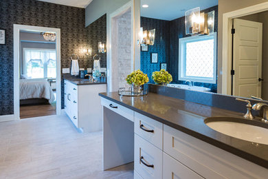 Example of a large cottage bathroom design in Cincinnati with shaker cabinets, white cabinets, blue walls and an undermount sink