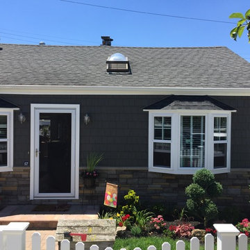 Long Beach Siding - Charcoal Smoke with Sterling Tight Cut Stone & Windows