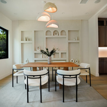 Dining Room with Plaster Arched Built-In Display Wall