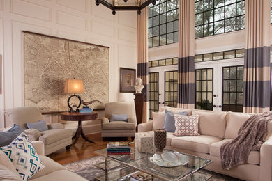 Large transitional open concept living room in Atlanta with beige walls and medium hardwood floors.