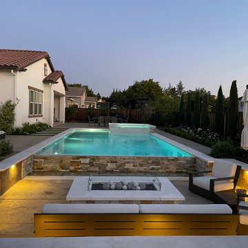 Livermore, Infinity edge swimming pool with a sunken firepit seating area