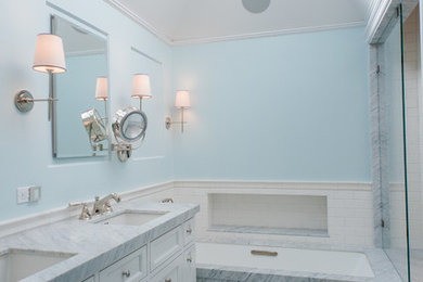 Example of a mid-sized classic master marble floor bathroom design in San Francisco with furniture-like cabinets