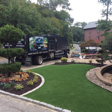 Synthetic Turf, Rubber Mulch & Stonescaping with Cobblestone Borders
