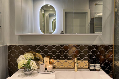 Inspiration for a medium sized contemporary bathroom in London with dark wood cabinets, quartz worktops, a single sink and a floating vanity unit.