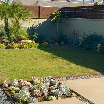 Outdoor Play Space with natural stone water feature