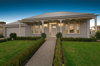 Photo of a traditional home design in Melbourne.