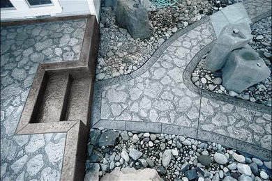 Inspiration for a large courtyard patio remodel in Seattle