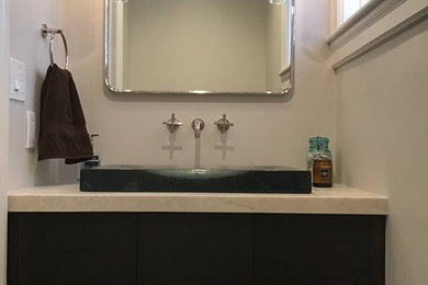 Example of a trendy powder room design in Other