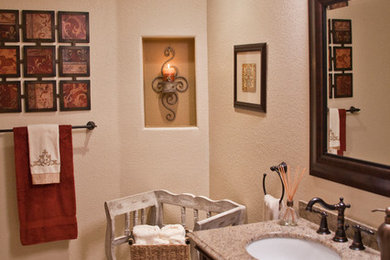 Bathroom - small transitional 3/4 beige tile terra-cotta tile bathroom idea in San Diego with recessed-panel cabinets, dark wood cabinets, granite countertops and beige walls