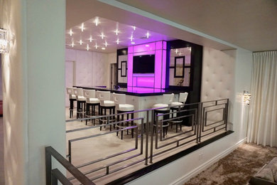 Example of a large minimalist single-wall seated home bar design in New York