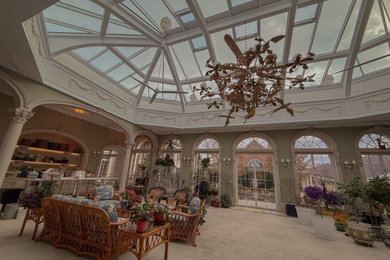 French country sunroom photo in DC Metro with a glass ceiling