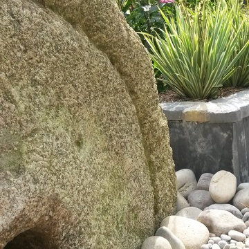 An old mill wheel was integrated into the plan