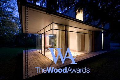 Inspiration for a medium sized contemporary conservatory in Other with a standard ceiling and grey floors.