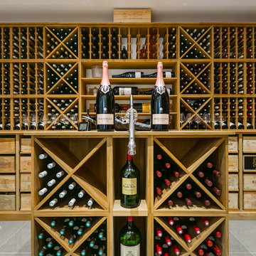 Large private wine room in Wimbledon, London using solid Oak racking
