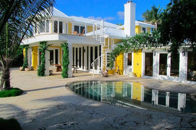 Patio - coastal patio idea in Miami