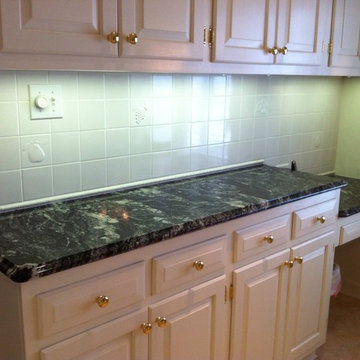 Silver Waves Granite on White Cabinets