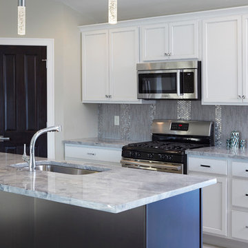 Contemporary white kitchen with shine and elegance