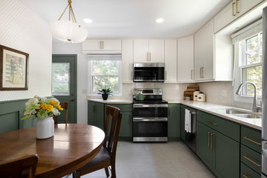 Enclosed kitchen - small transitional vinyl floor and beige floor enclosed kitchen idea in Minneapolis with a double-bowl sink, recessed-panel cabinets, green cabinets, quartz countertops, beige backsplash, quartz backsplash, stainless steel appliances, no island and beige countertops