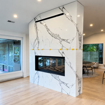 CUSTOM FLOOR-TO-CEILING FIREPLACE WITH MITERED RETURNS