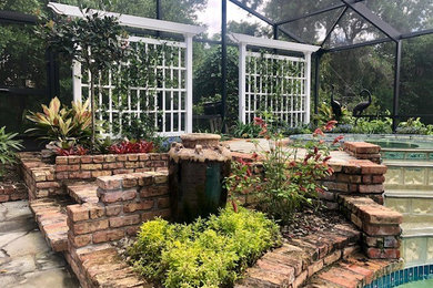 Inspiration for a tropical landscaping in Orlando.
