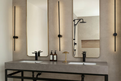 Mid-sized trendy master gray tile and porcelain tile porcelain tile, gray floor and double-sink bathroom photo in Toronto with gray cabinets, a one-piece toilet, beige walls, an undermount sink, concrete countertops, gray countertops, a niche and a freestanding vanity
