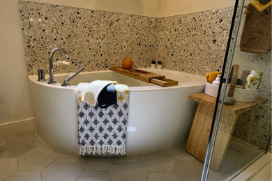 Small minimalist yellow tile and stone tile porcelain tile, gray floor and single-sink bathroom photo in Ottawa with flat-panel cabinets, light wood cabinets, a wall-mount toilet, beige walls, an integrated sink, quartz countertops, white countertops, a niche and a floating vanity