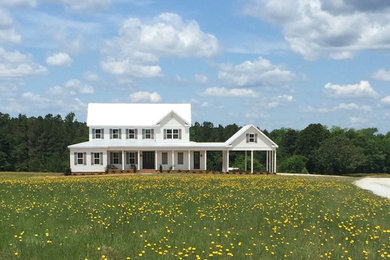 Large country white two-story gable roof idea in Atlanta