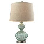 Elk Home - 25" Smoked Glass Table Lamp, Pale Green - This lamp is part of a collection that integrates the glamour of an exotic getaway with the casual comfort of a weekend at the beach house. Rustic toile patterns in tonal blues are paired with batik inspired textiles that are all rich and graphic in feeling. The Pale Green Smoked Glass Table Lamp is topped with a round hard back shade in metallic linen. The base measures 13"W x 13"D x 25"H with shade measurements of 13''W x 13"D x 10"H. The fixture uses one 100 watt 3-way medium bulb with a switch on the socket.
