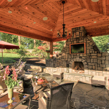Outdoor living, gazebo, outdoor fireplace, water feature.