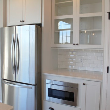 Aspen Homes- Midwest Minimalist White on White Kitchen