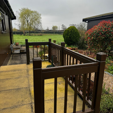 Dark Timber Balustrade Beside a Lodge Path