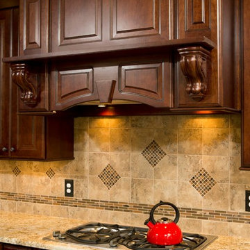 Custom Woodwork, Granite Counters Boost Kitchen Remodel
